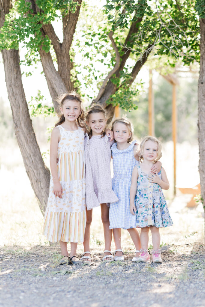 flour little girls with spring outfits on