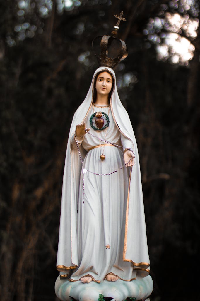 Beautiful statue of the Immaculate Heart of Mary outdoors in Brazil, symbolizing peace and devotion.
